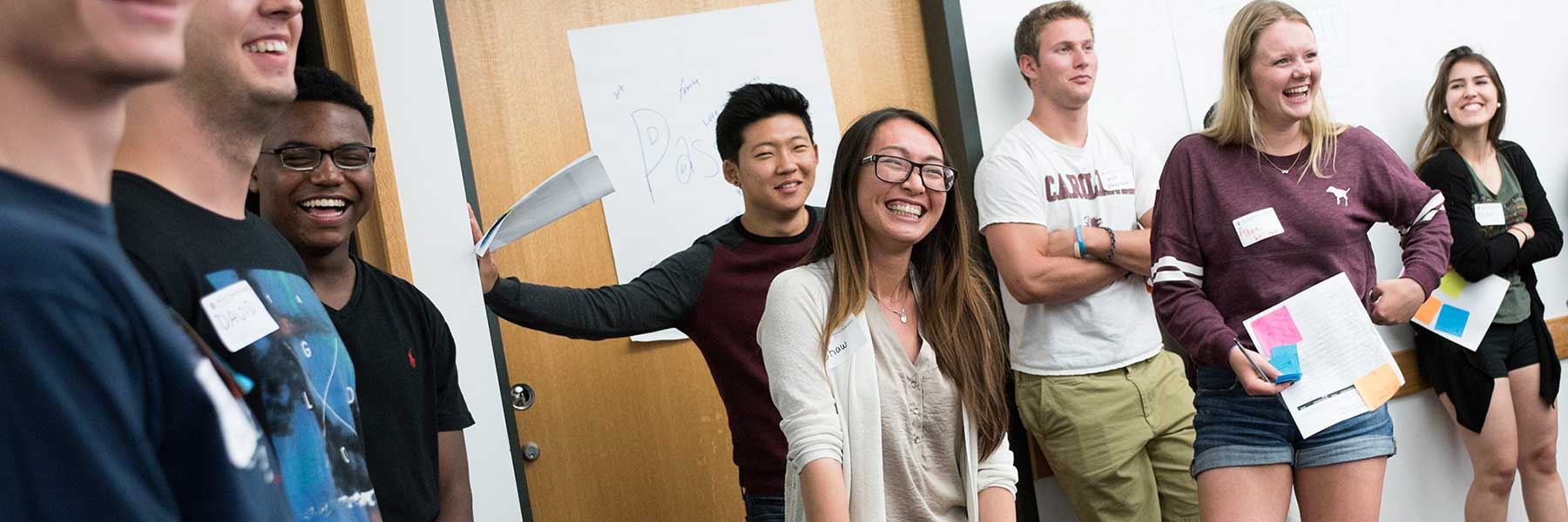students laughing in a classroom